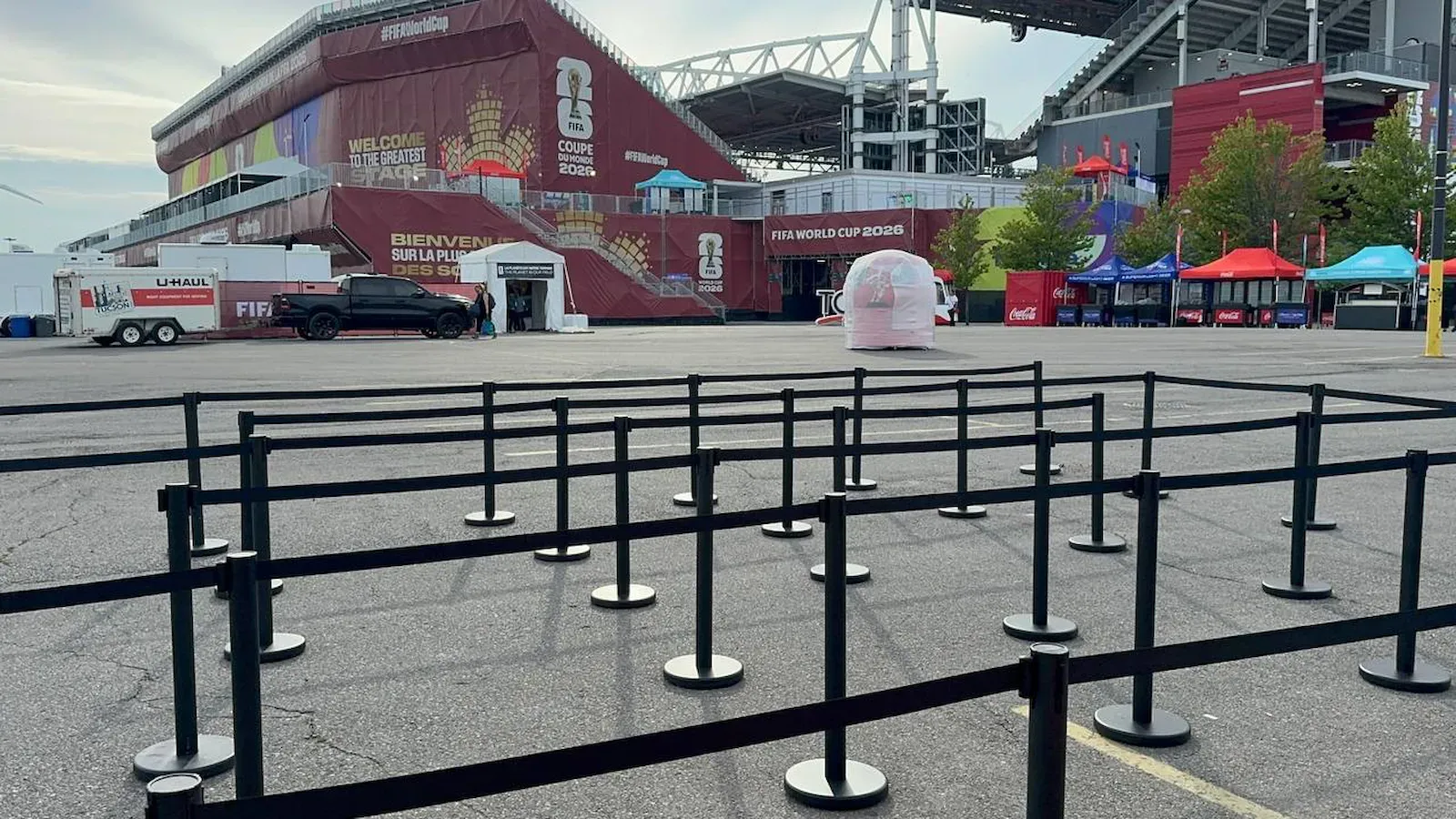 Black belt stanchions forming outdoor queue lanes