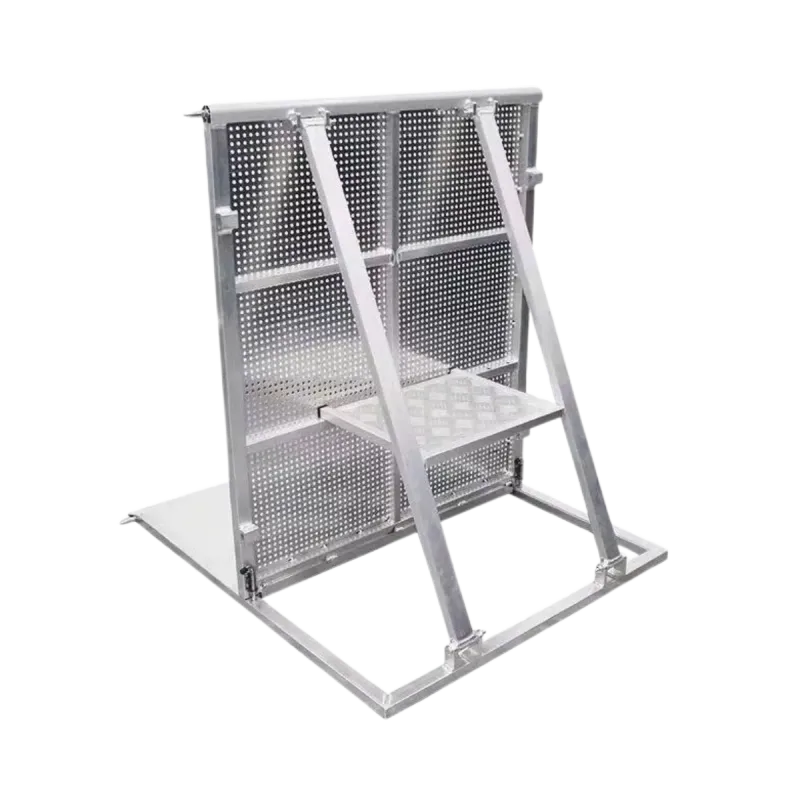 Aluminium stage barrier section from behind, showing the raking brace and the platform step